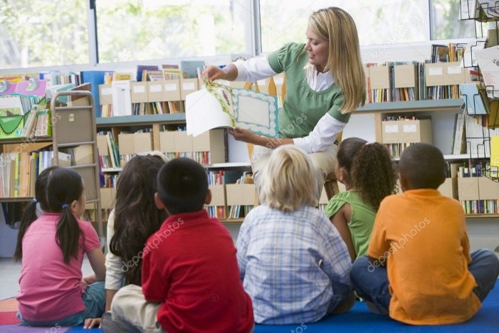teacher reading book to class