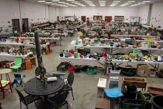 many tables with garden items for sale